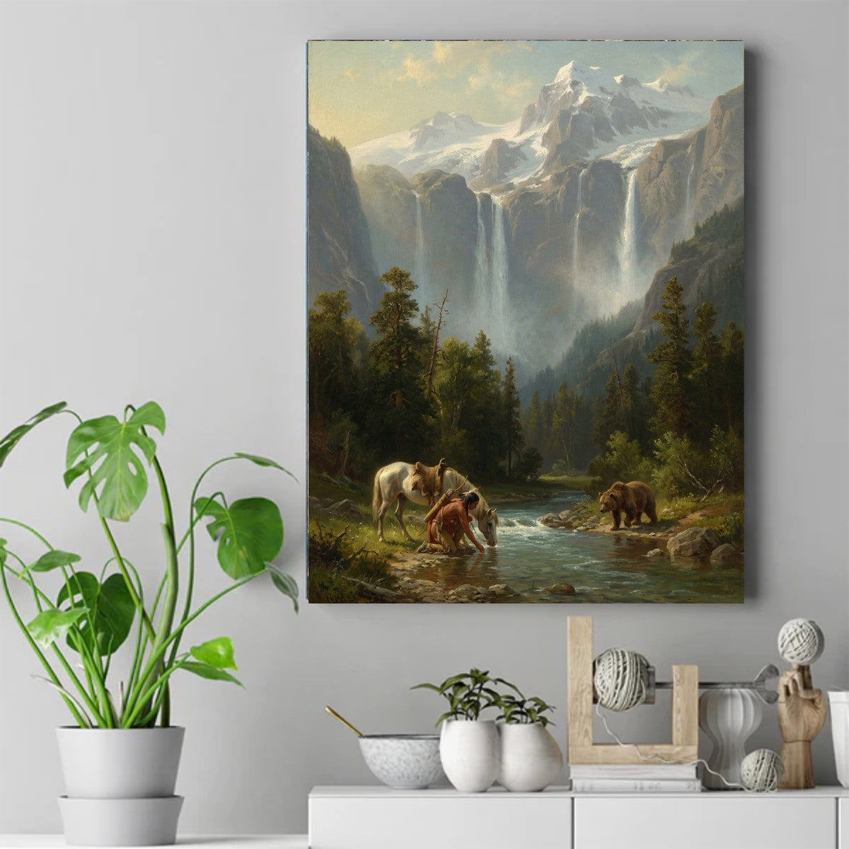 Native man kneeling by a stream with a pale horse and a bear nearby, snow-capped mountains and waterfalls behind. – ảnh 2
