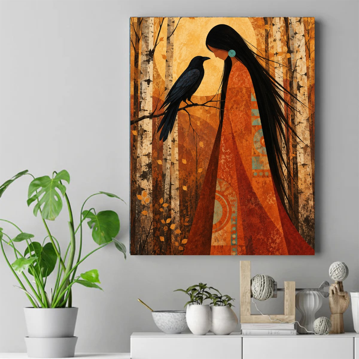 Native woman in an orange wrap facing a black raven on a branch, golden sun behind her, autumn birch trees – ảnh 2