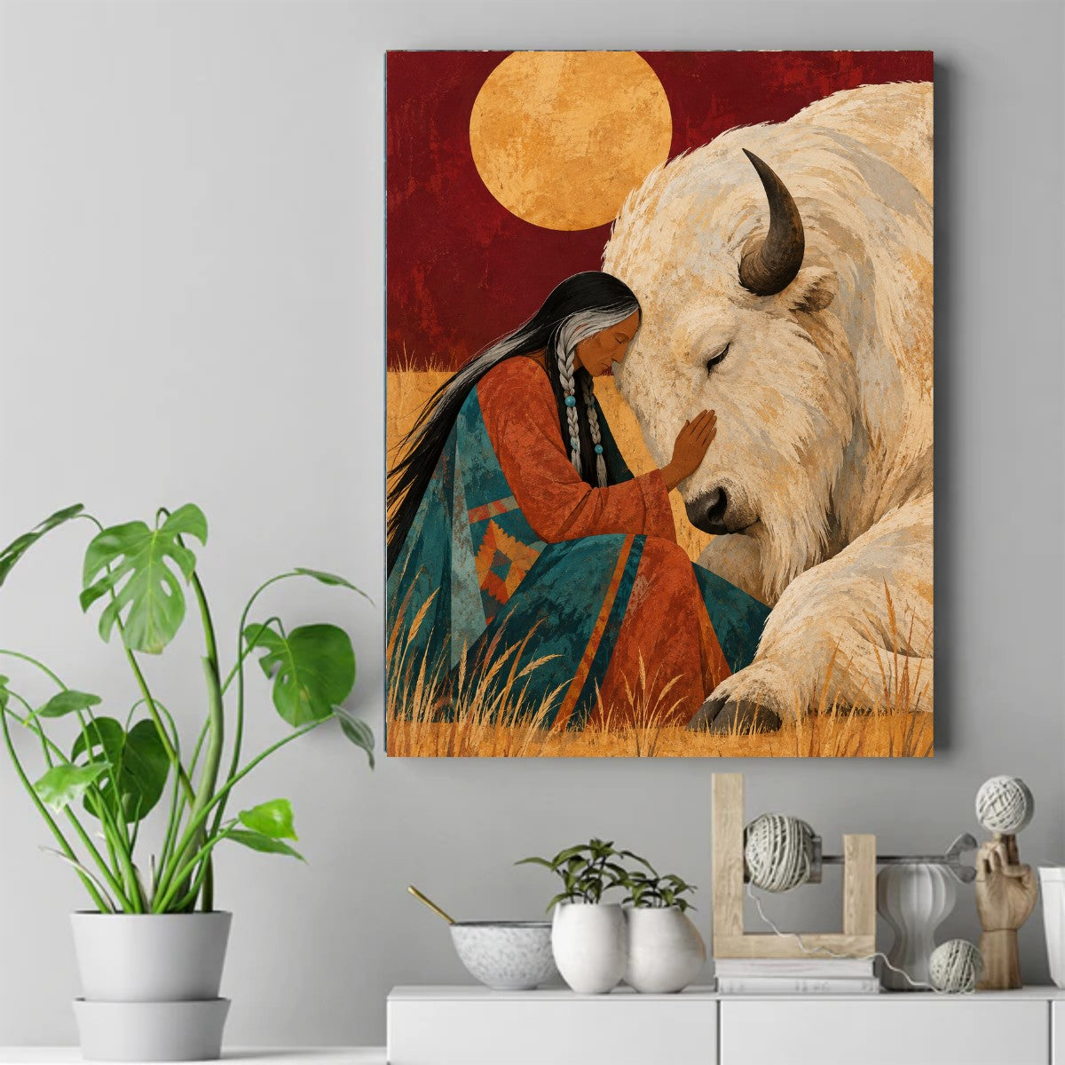 Native woman in a teal blanket touching the nose of a resting white bison beneath a golden moon in a red sky. – ảnh 2