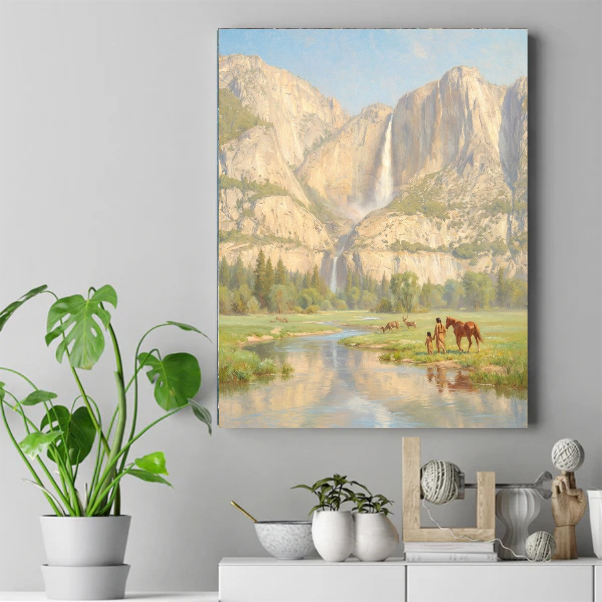 Painting of Native figures and a brown horse standing by a river, with deer, green meadow, tall cliffs, waterfall behind them. – ảnh 2
