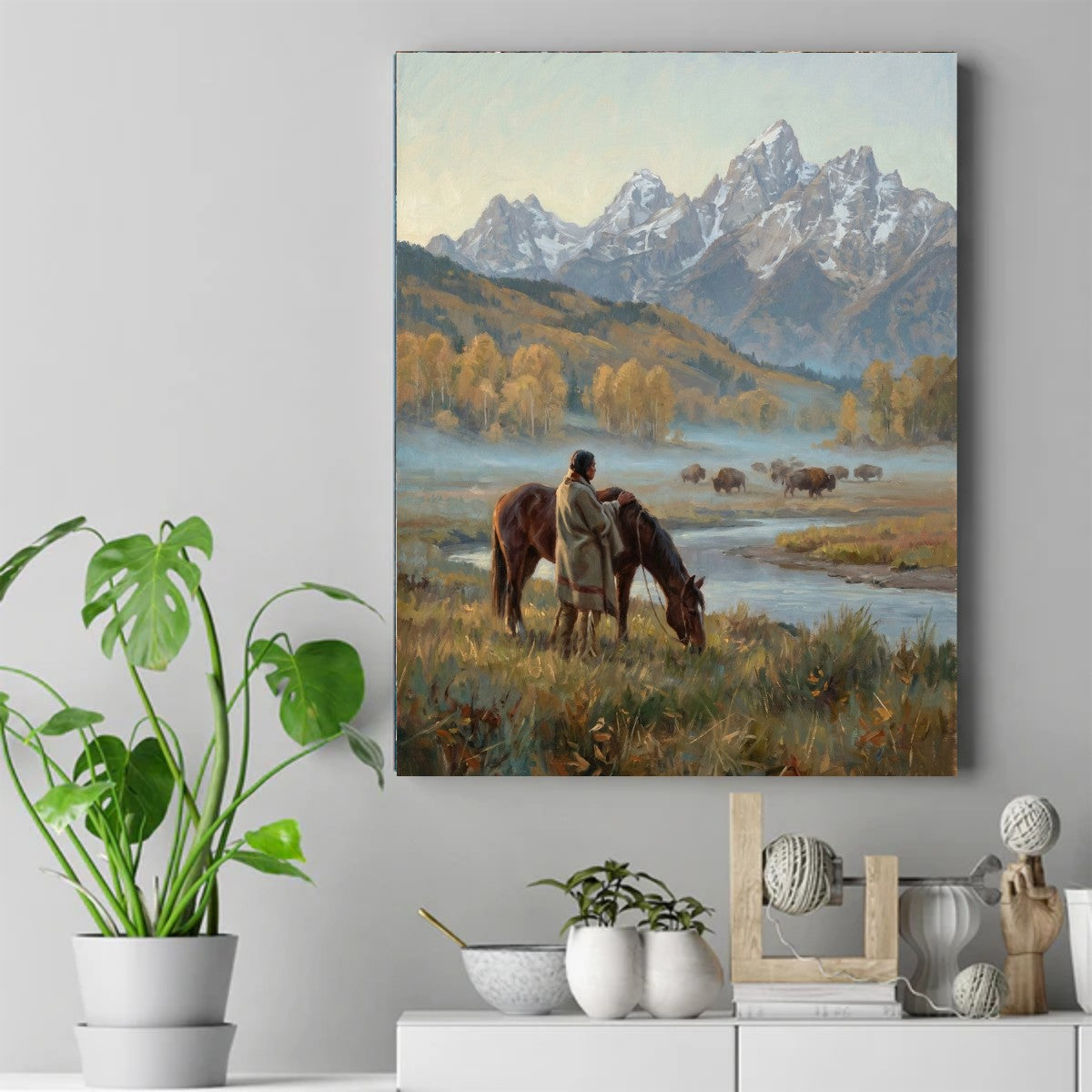 Native man beside a brown horse, bison grazing in a misty autumn valley with snow-capped mountains behind. – ảnh 2