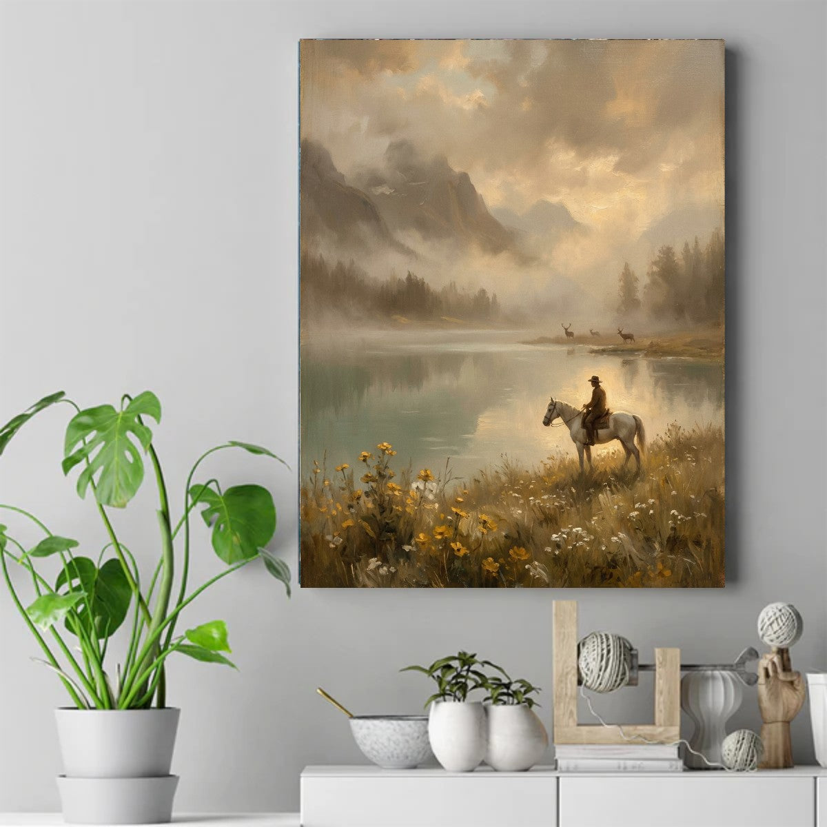 Rider on a white horse beside a misty lake with deer grazing, mountains and yellow wildflowers – ảnh 2