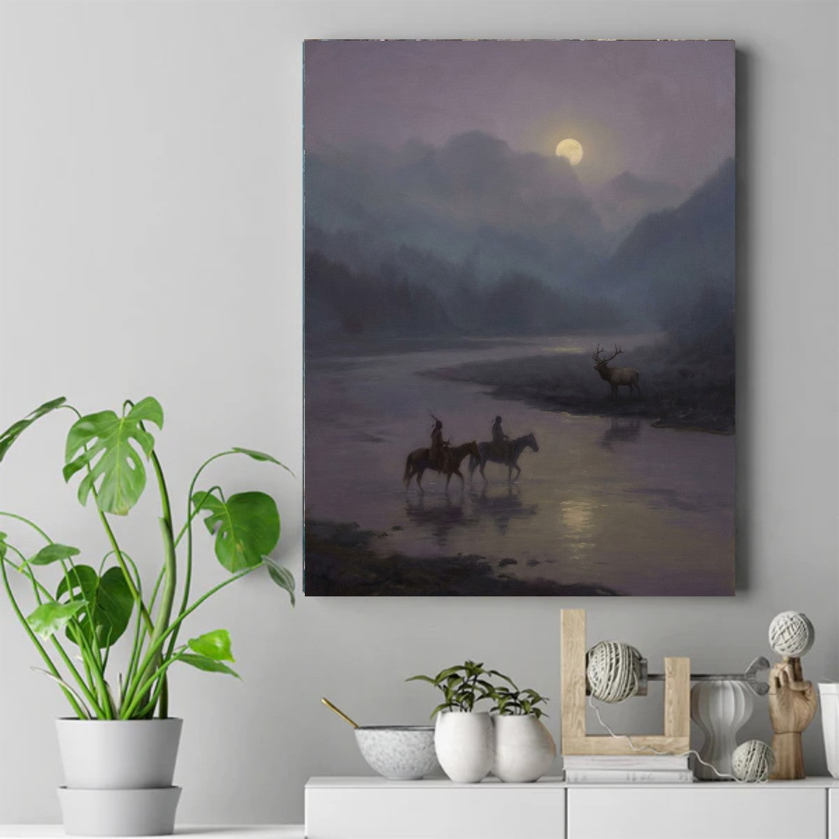 Two Native riders on horseback crossing a moonlit river at night with an elk standing on the bank – ảnh 2