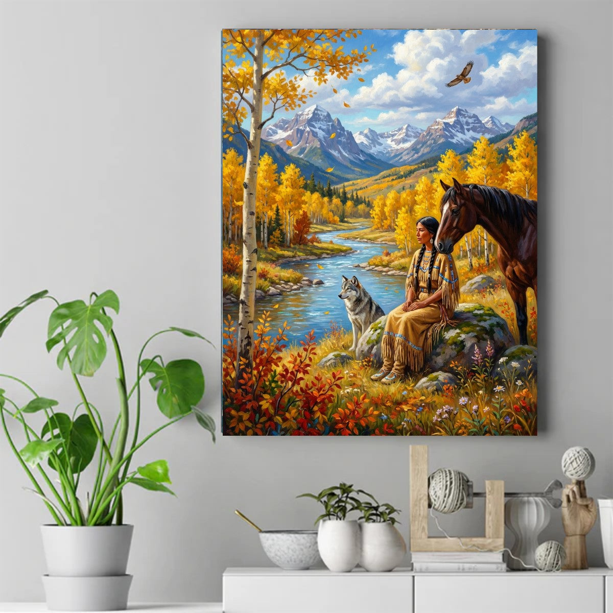 Native woman seated with a gray wolf and brown horse, autumn trees, snowy mountains, and an eagle above. – ảnh 2