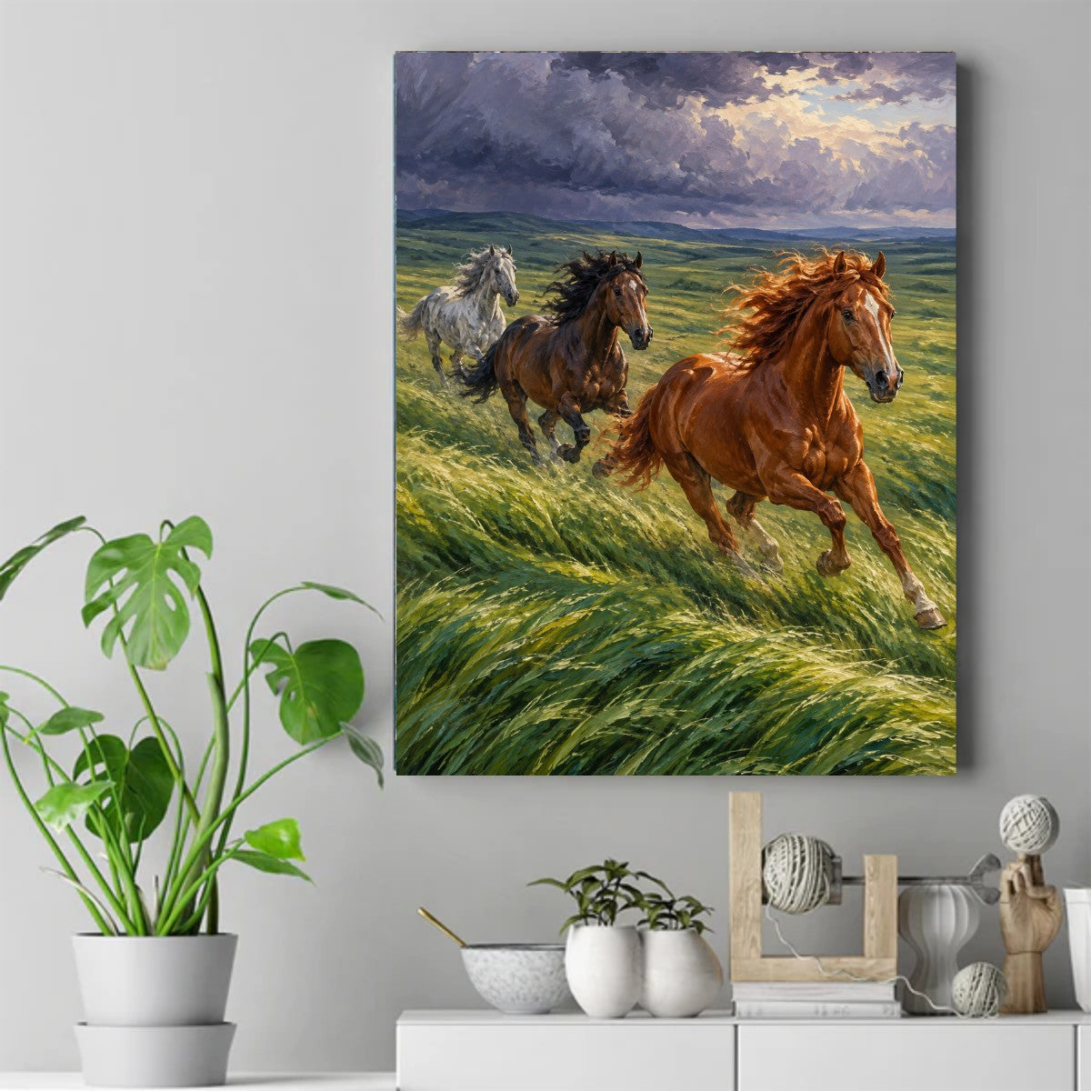 Three horses galloping through tall green grass beneath dark storm clouds, led by a chestnut horse with a windblown mane – ảnh 2