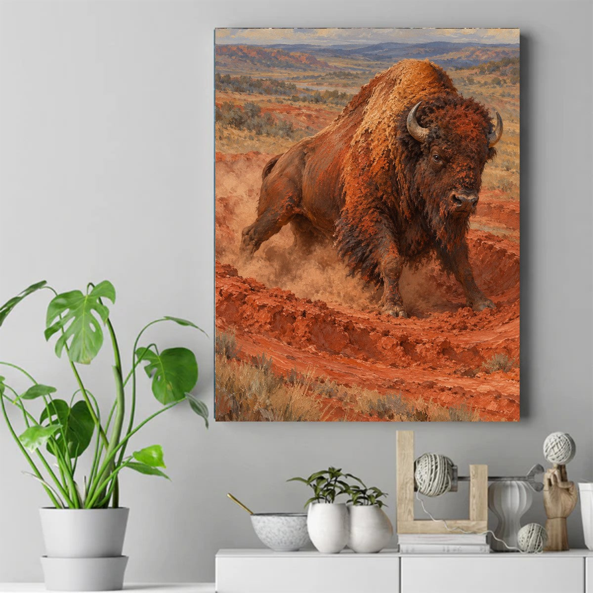 A dark brown bison running through red dust on an open prairie with distant bluffs and a cloudy sky behind it – ảnh 2