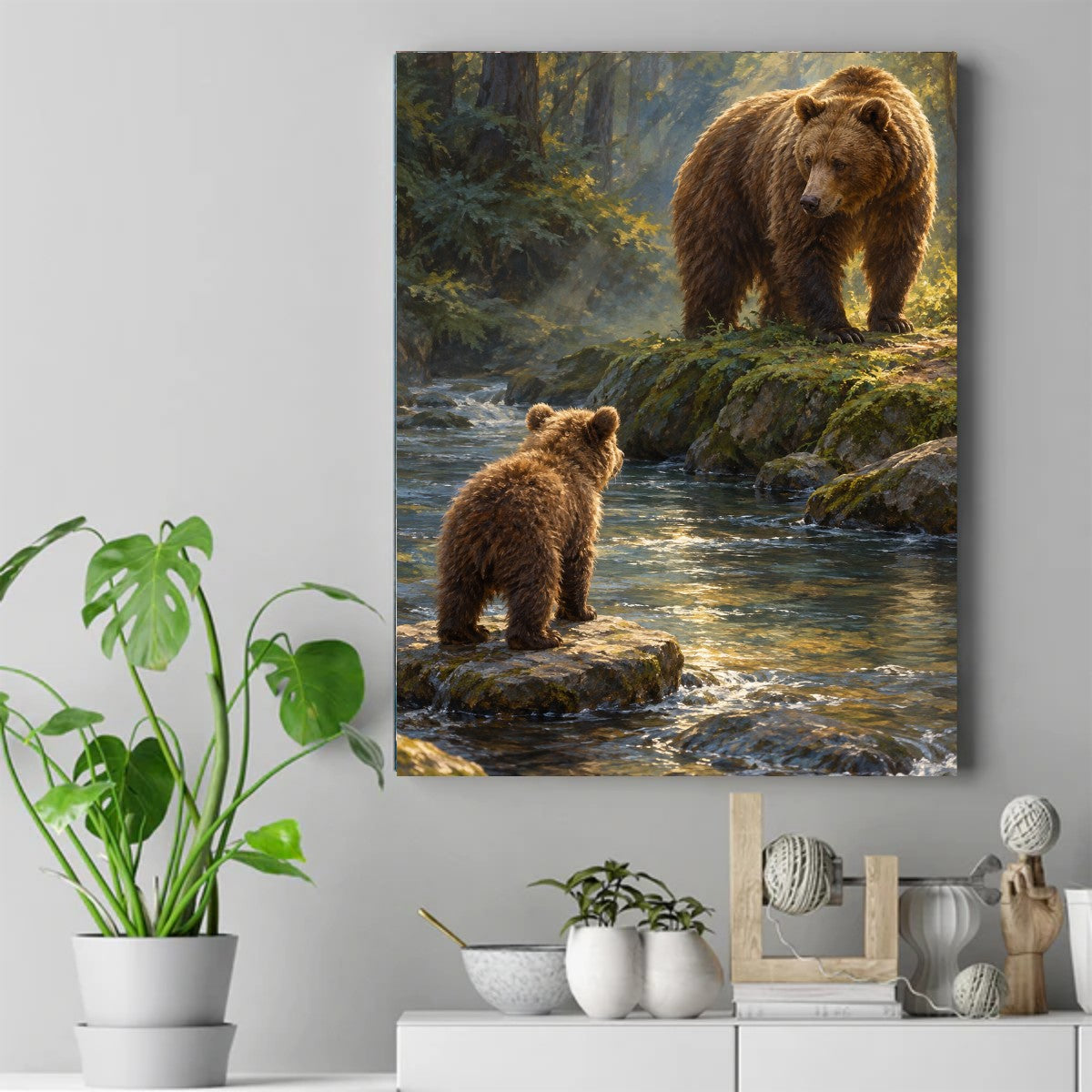 Adult brown bear on a mossy bank looking down at a small cub standing on a rock in a sunlit forest stream – ảnh 2