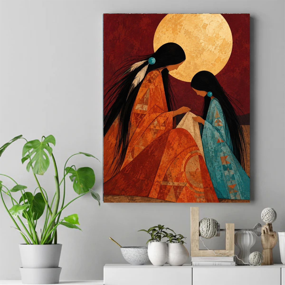 Native American mother and daughter sewing white cloth under a full moon, in orange and blue dresses with turquoise beads. – ảnh 2