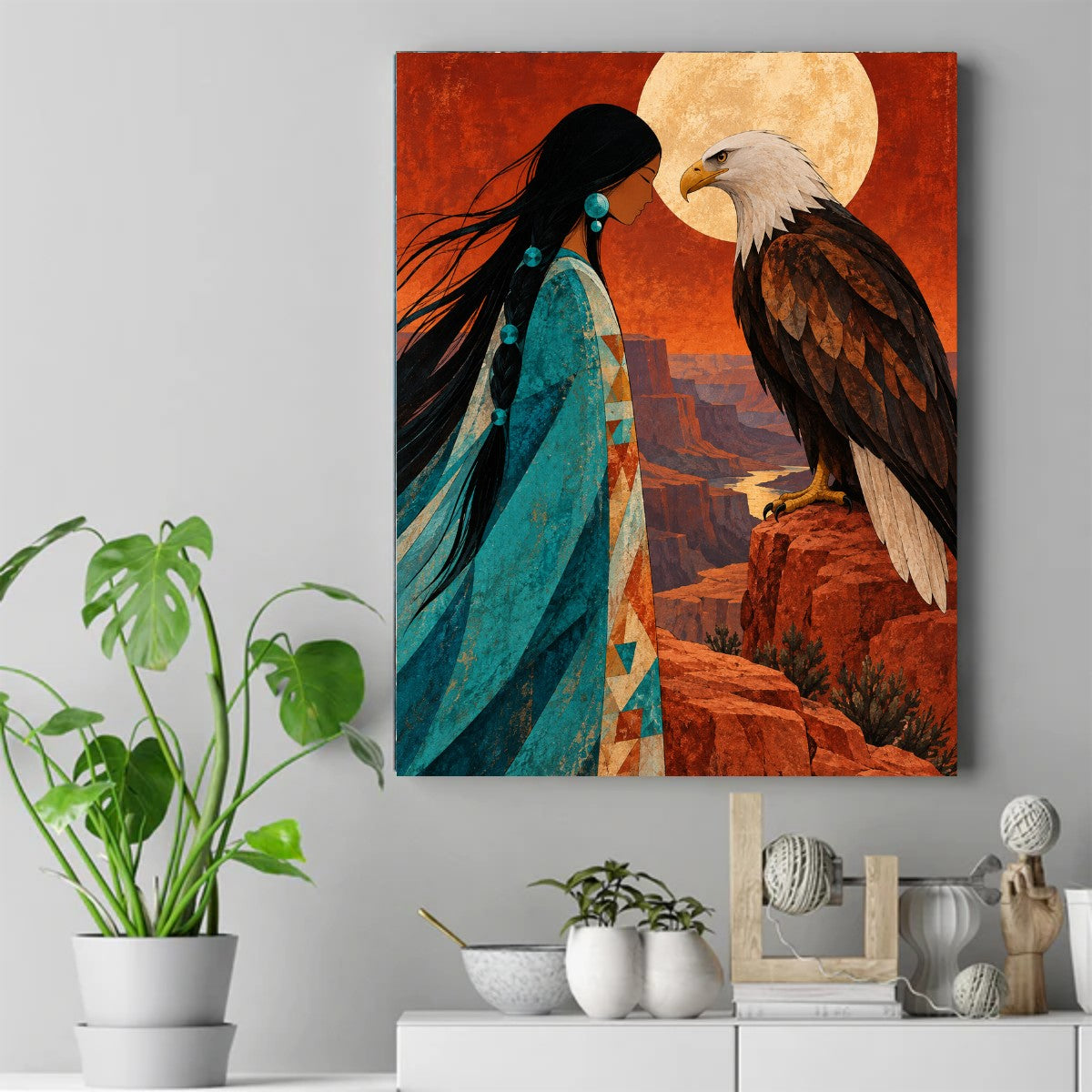Native woman in turquoise robe facing a bald eagle on a red cliff below a large full moon – ảnh 2