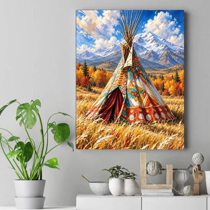 Colorful painted teepee in tall golden grass with autumn trees, snow-capped mountains, and blue cloudy sky – ảnh 2