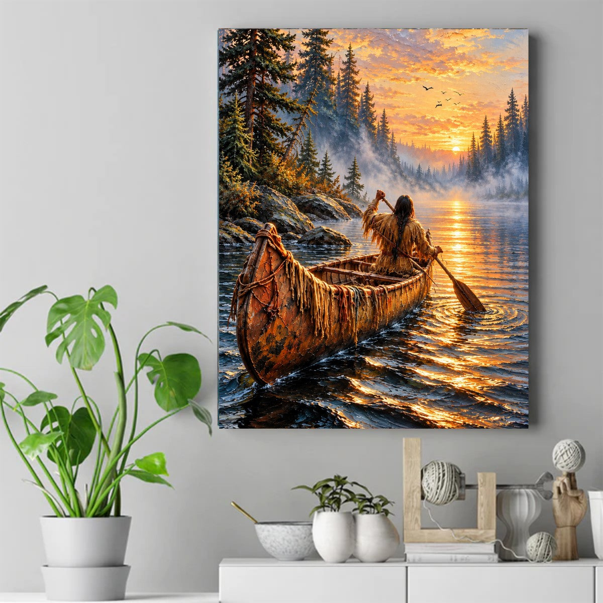 Native woman paddling a canoe on a misty lake at sunset, golden light, pine trees, and birds in the sky. – ảnh 2