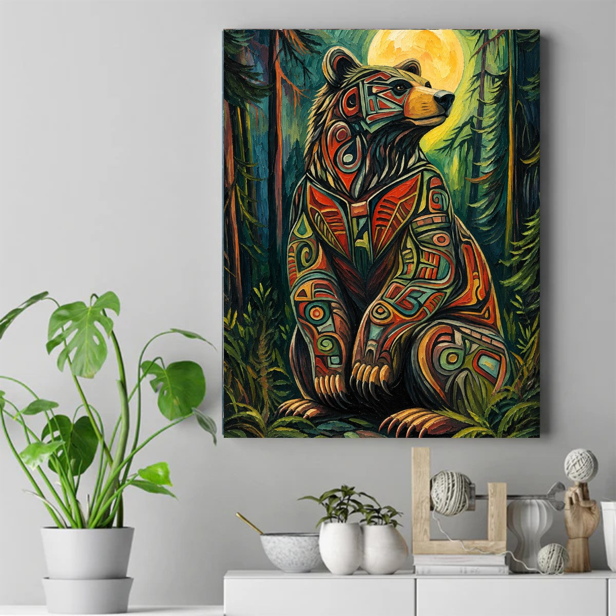 Stylized bear with red, teal, and black patterns sitting in a dark forest under a large yellow moon. – ảnh 2