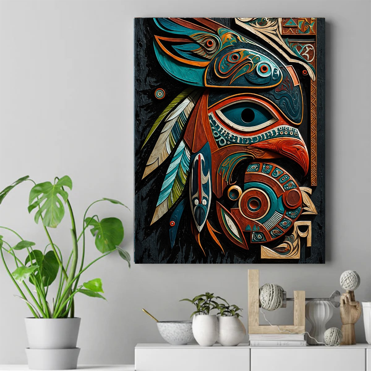 Pacific Northwest Native style eagle mask design in teal and rust red with long striped feathers on a dark background – ảnh 2